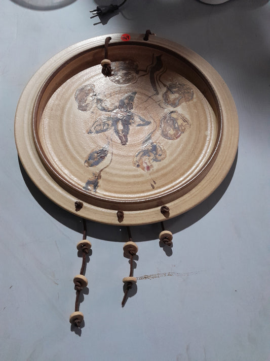 Beautiful wall ornament featuring floral design, perfect for lounge or outdoor decor.