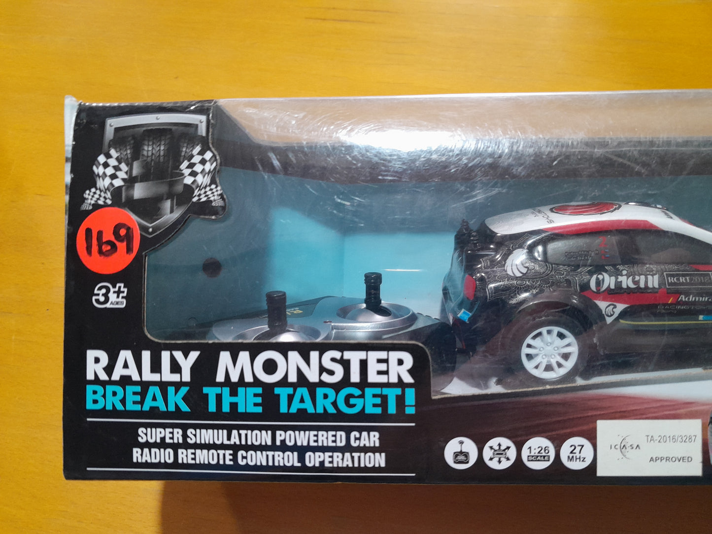  Side view of Rally Monster remote control car displaying its sporty look and wheels.