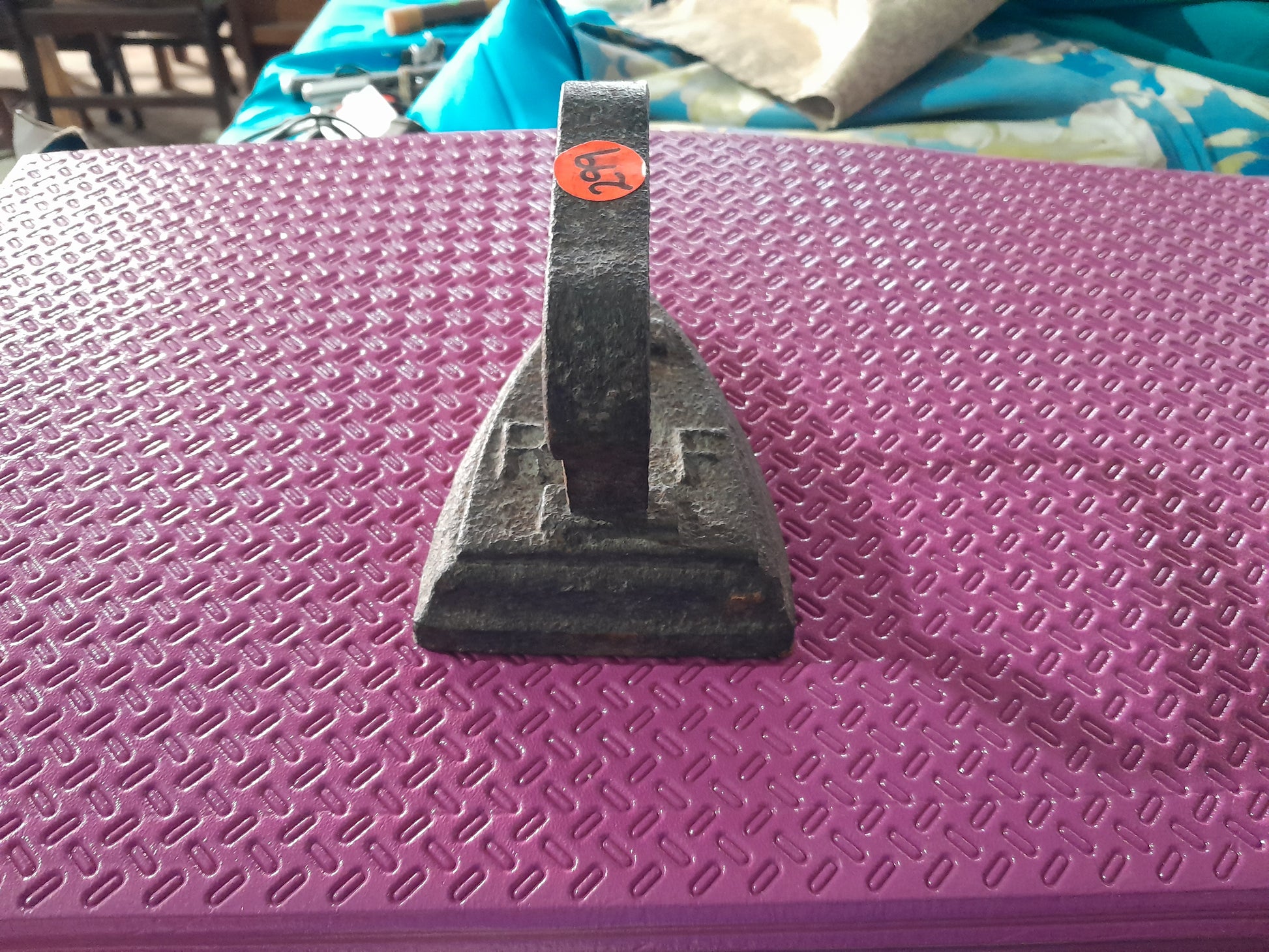 Classic RF No. 4 sad iron, crafted from solid cast iron, great for traditional ironing methods.