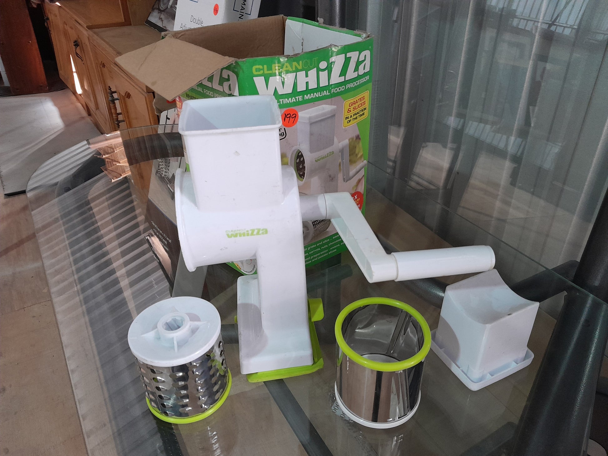 CleanCut Whizza food processor packaging featuring details about its premium quality and functionality.