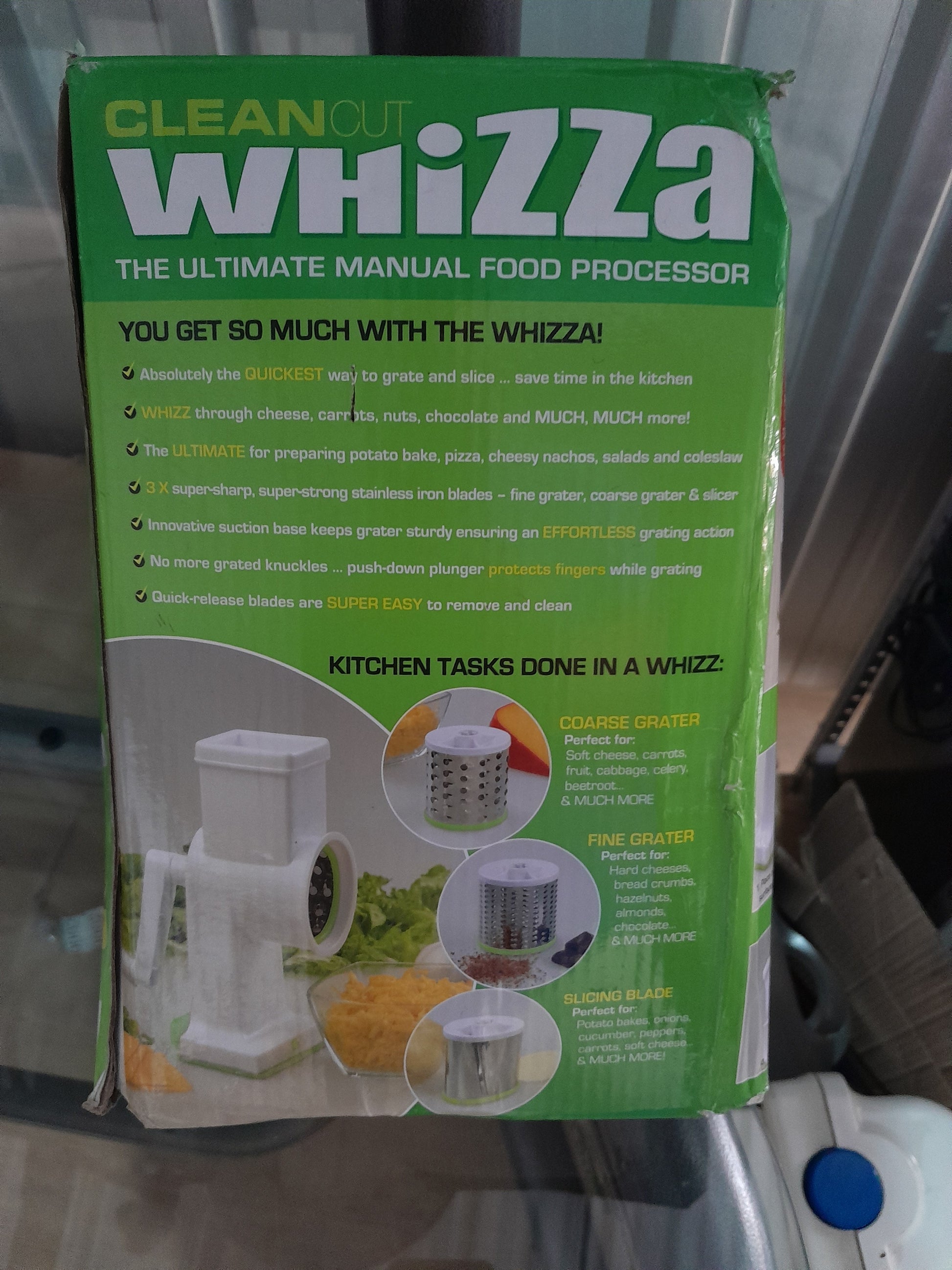 Box of CleanCut Whizza featuring premium stainless steel blades and ergonomic design for easy food preparation.