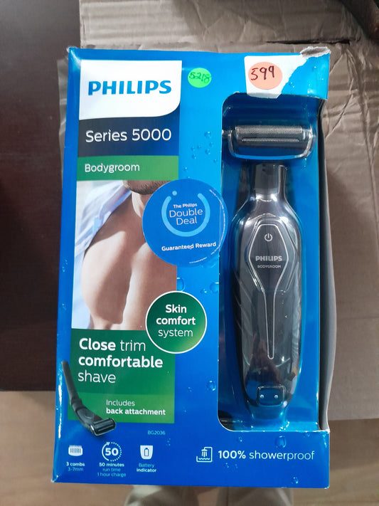 Philips Bodygroom 5000 with three attachments for versatile grooming, includes fine and coarse graters.