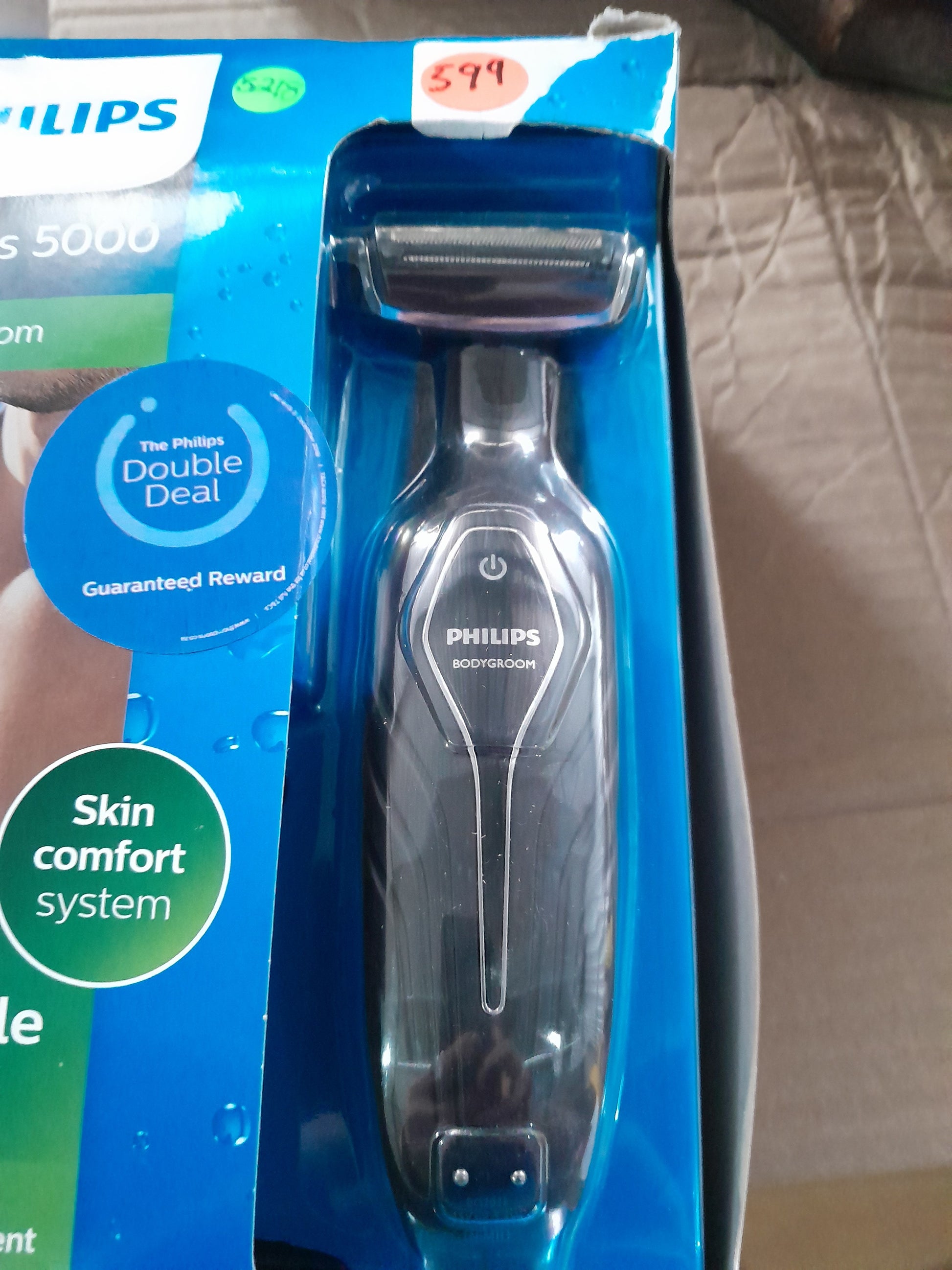Philips Bodygroom series 5000, featuring skin comfort system for smooth grooming.