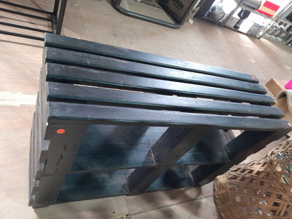 Sturdy wooden black TV stand, perfect for supporting your television and media equipment.