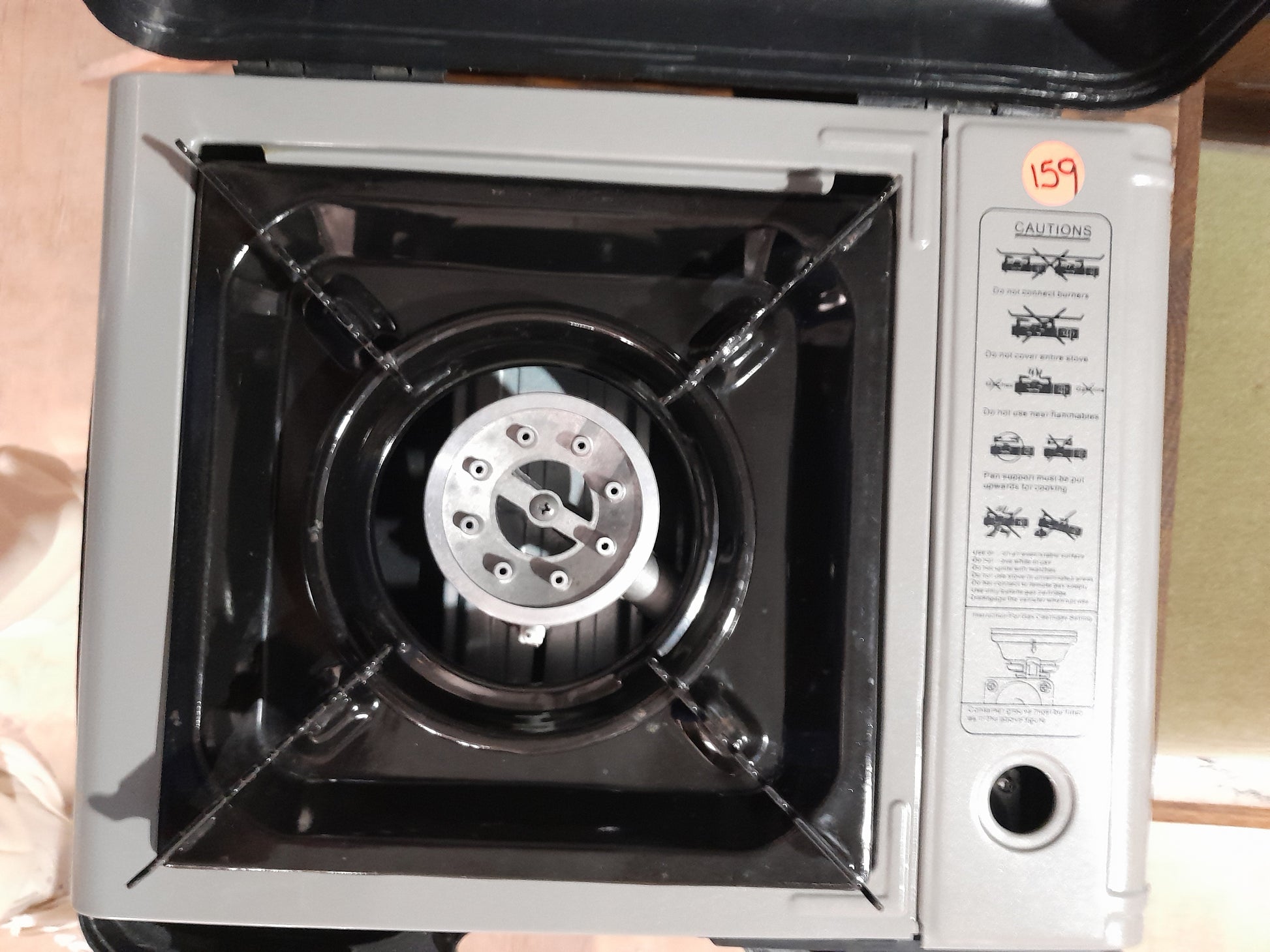 A top view of a Bush Baby camping stove, perfect for outdoor cooking and camping adventures.