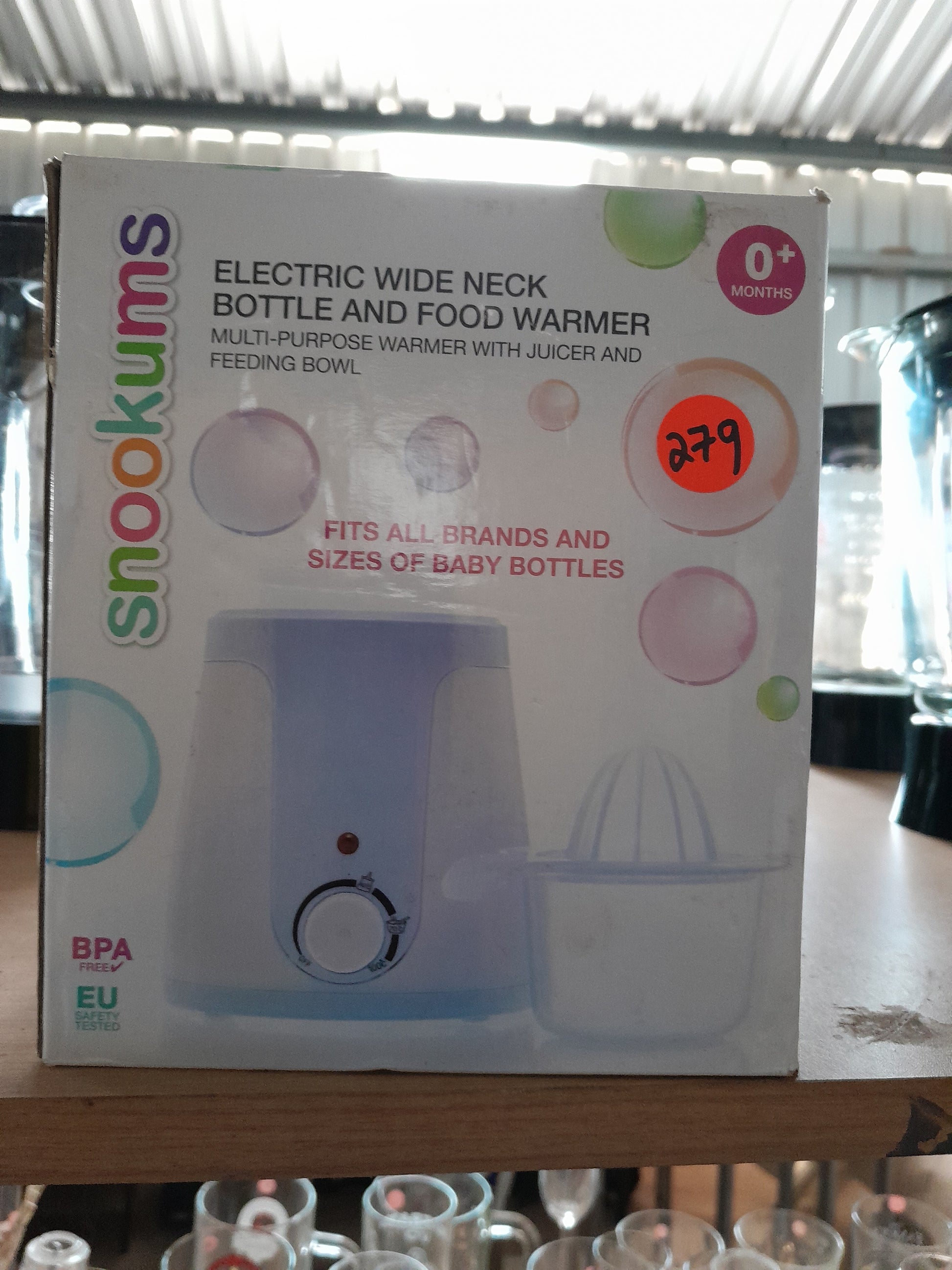 Snookums Electric Bottle and Food Warmer in use, ideal for keeping food warm and bottles heated.