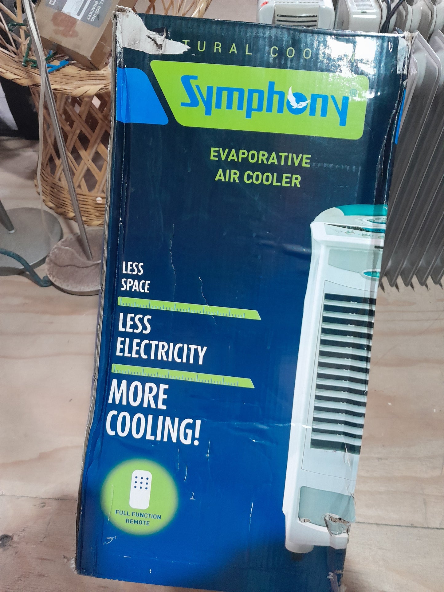 Remote control for Symphony evaporative air cooler, designed for convenient operation on hot days.