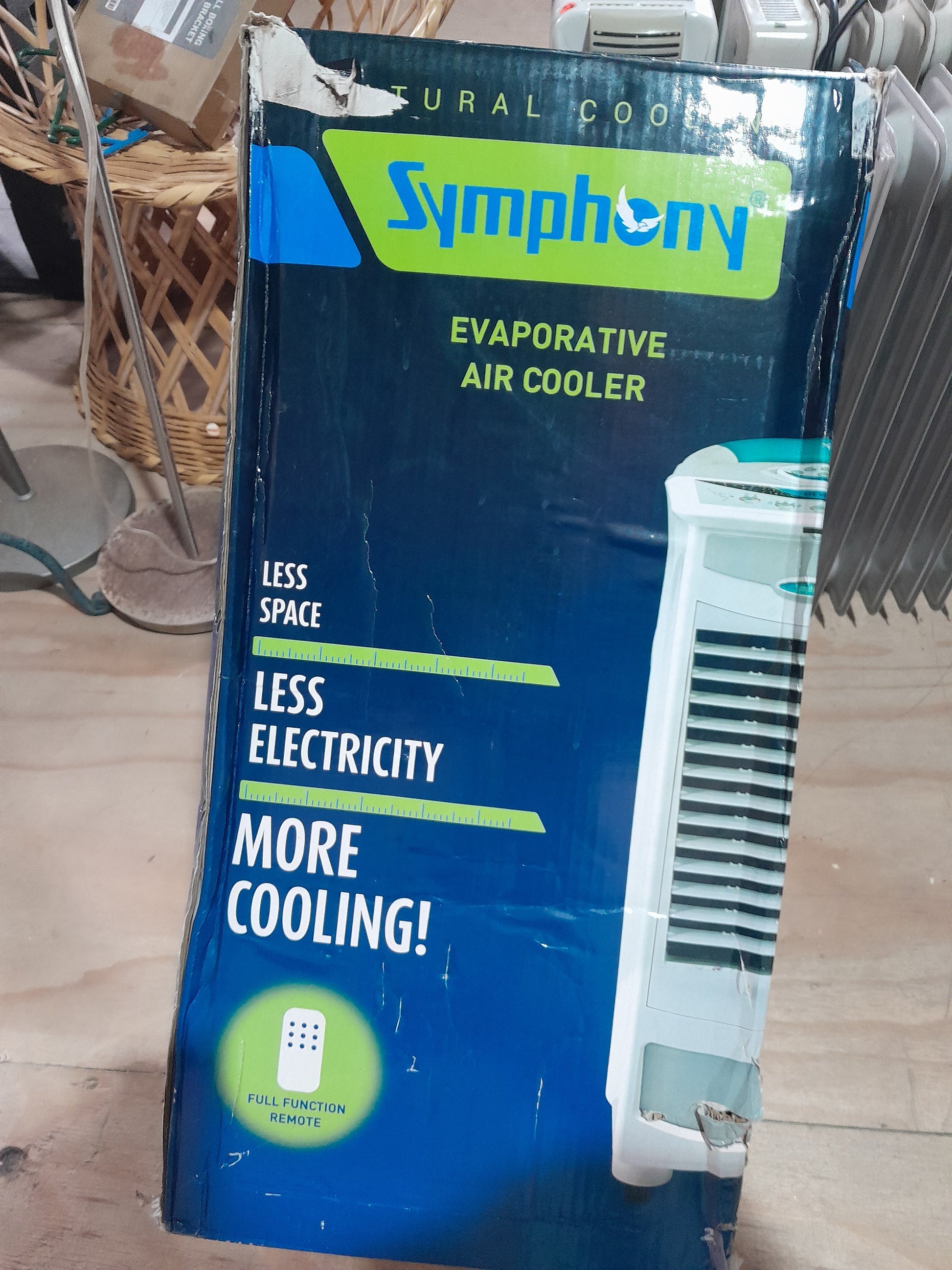 Remote control for Symphony evaporative air cooler, designed for convenient operation on hot days.