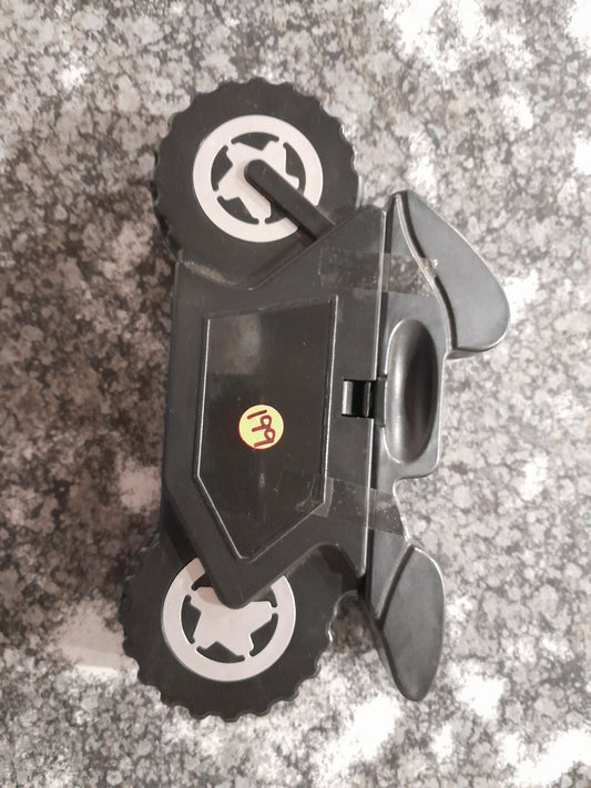 Compact motorcycle-shaped toolset featuring screwdrivers and bits for basic repairs.