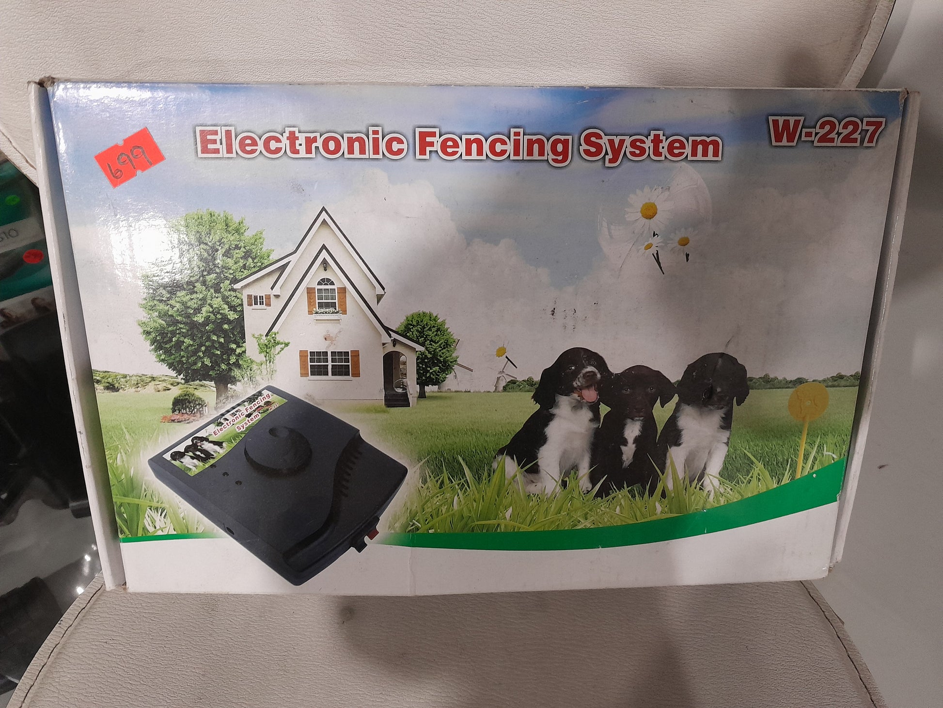 Electronic Pet Fencing System W-227 ensuring pet safety with dogs enjoying outdoor space.
