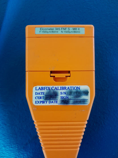 Elcometer 345 Gauge in use, perfect for professionals measuring metal coatings.