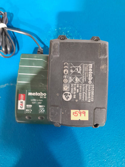 Metabo 18V battery and 12V-18V charger in great condition for power tools.