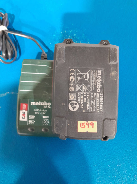 Metabo 18V battery and 12V-18V charger in great condition for power tools.