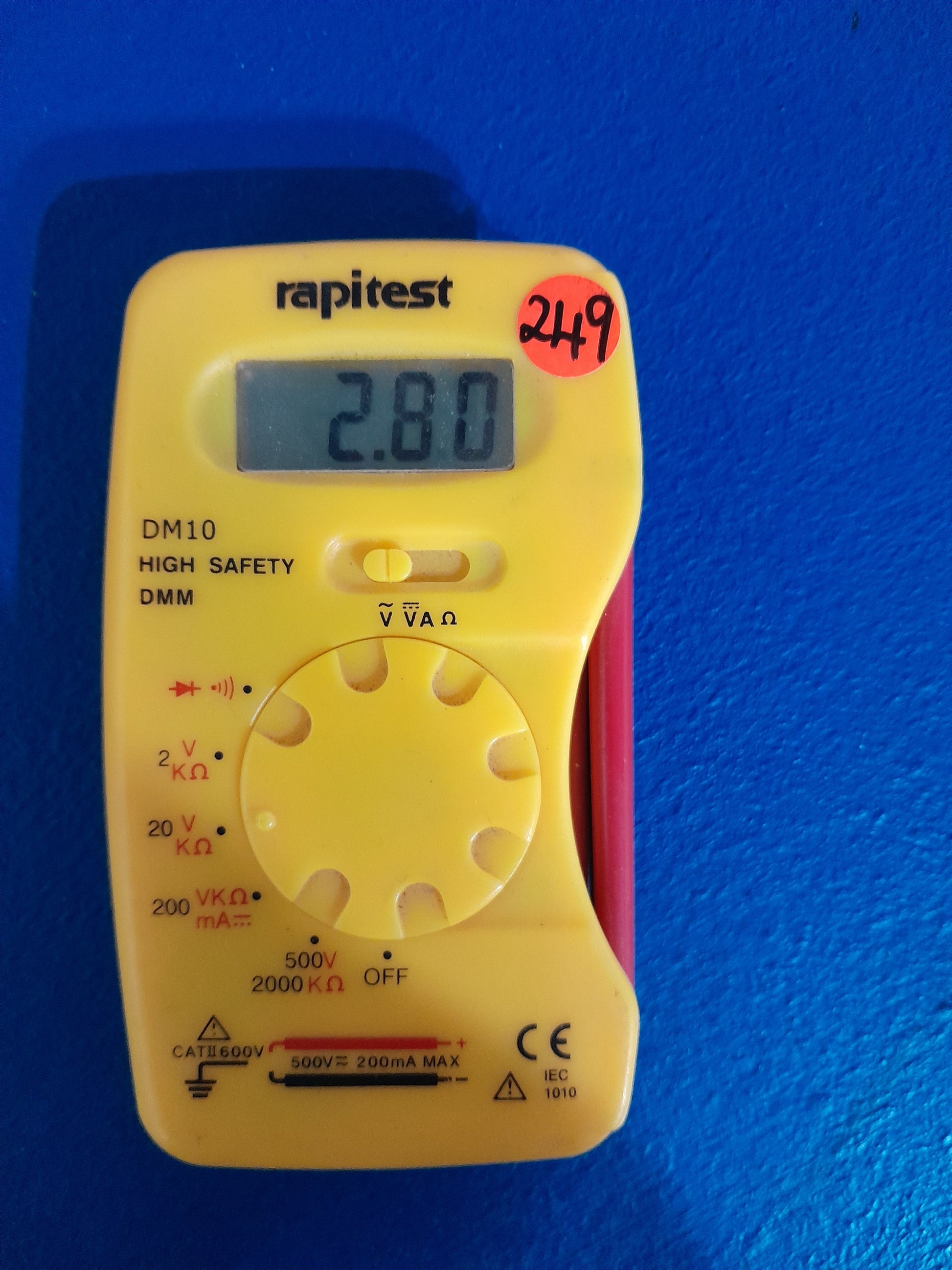 Rapitest DM10 digital multimeter measuring AC/DC voltage and resistance, compact and portable.
