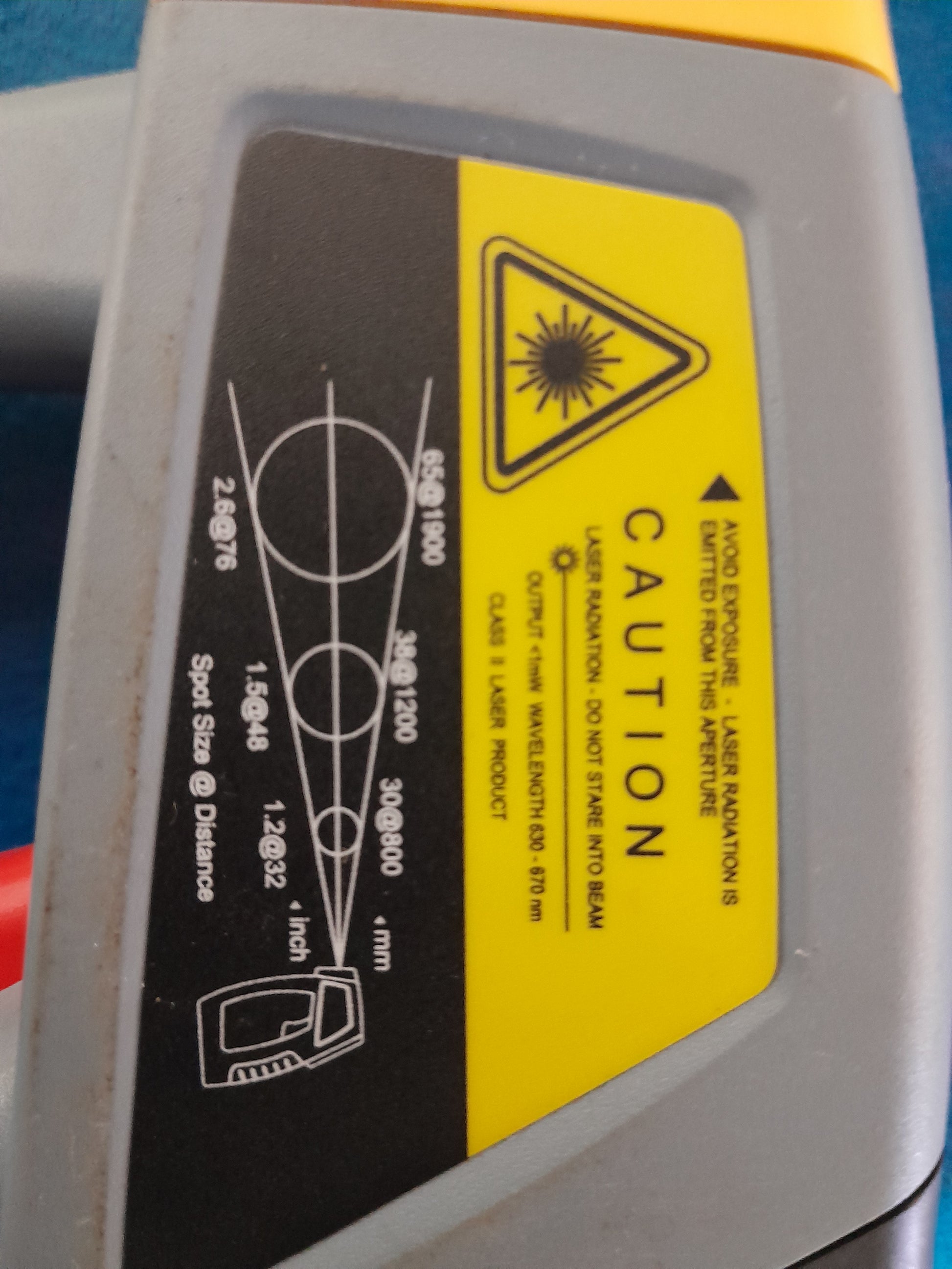 Warning label on ST 685 Infrared Thermometer highlighting safety precautions and laser usage.