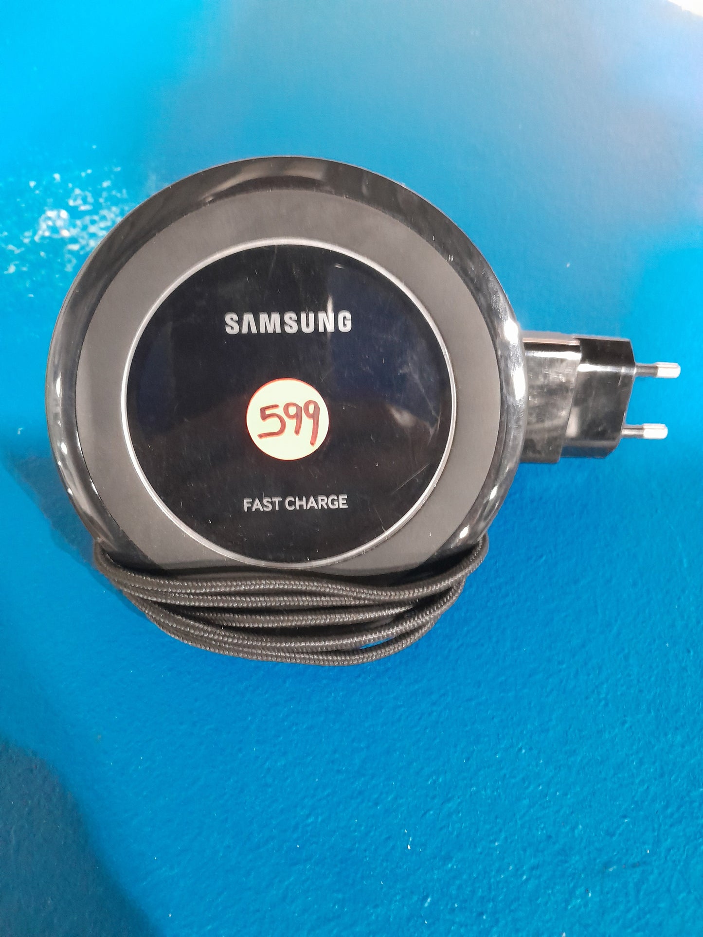 Samsung wireless charger with fast charge capability, a must-have for efficient smartphone charging.