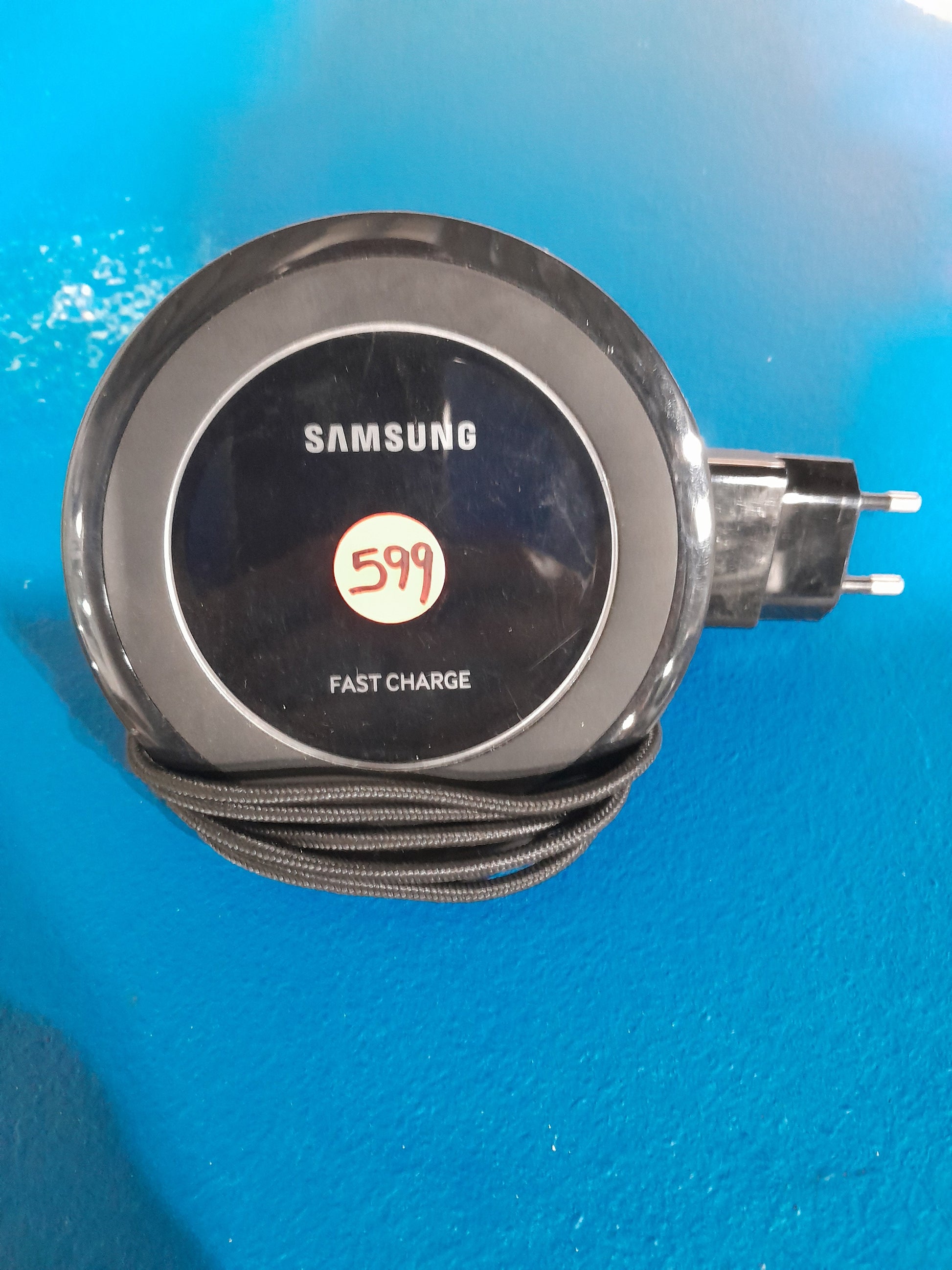 Samsung wireless charger with fast charge capability, a must-have for efficient smartphone charging.
