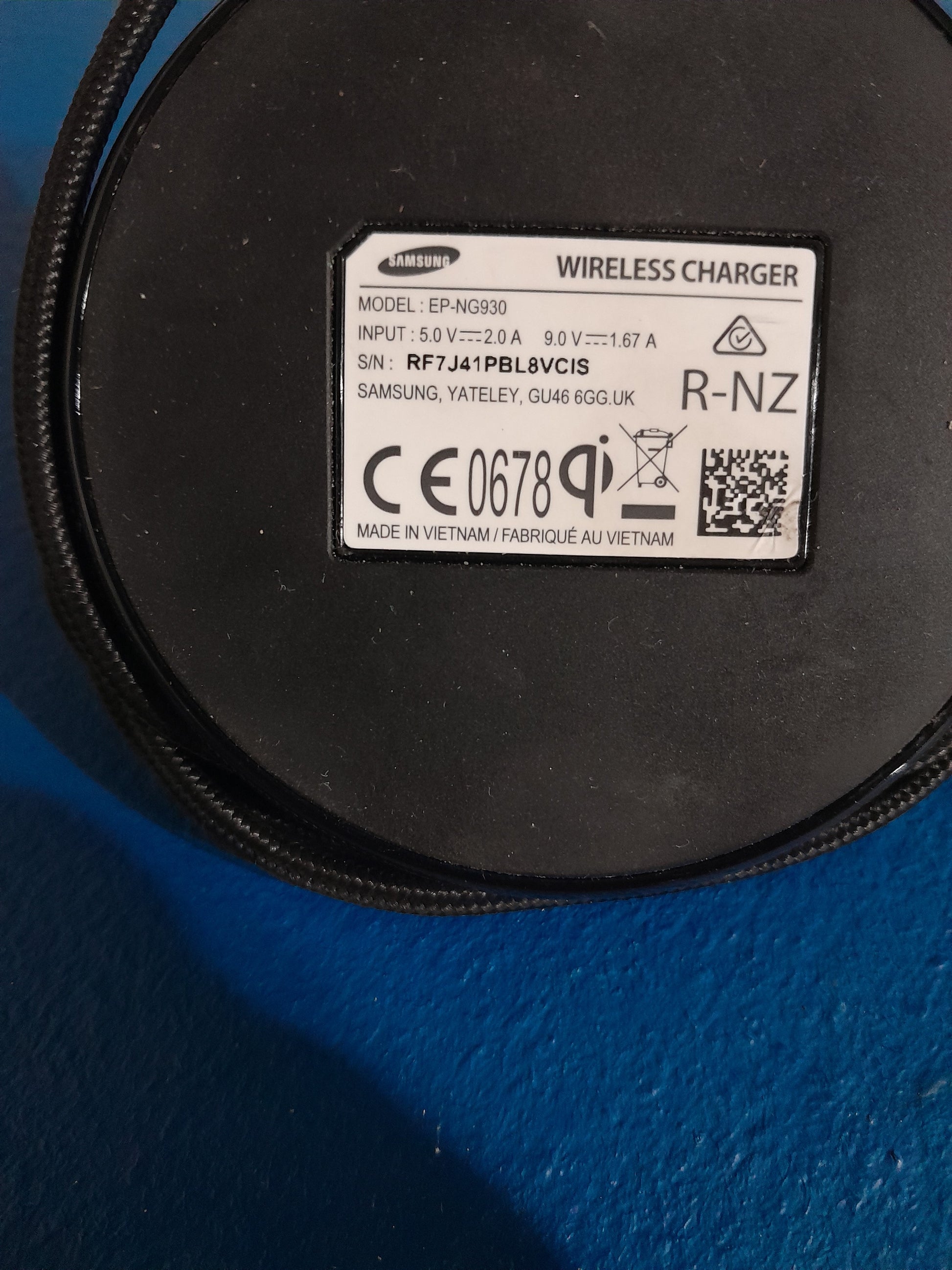 Wireless charging stand by Samsung, featuring fast charge capabilities and a compact design for easy use.