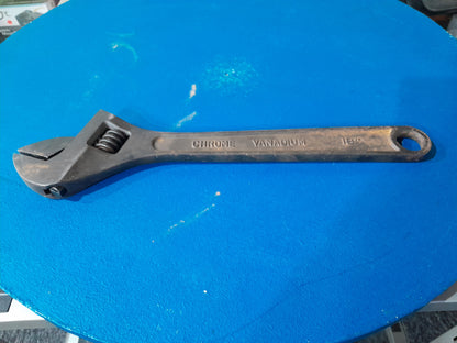 Durable Maxpower adjustable wrench on a vibrant blue background, essential for DIY projects.