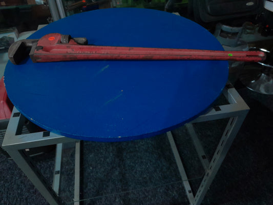 36-inch heavy-duty pipe wrench in good condition, ideal for plumbing tasks.