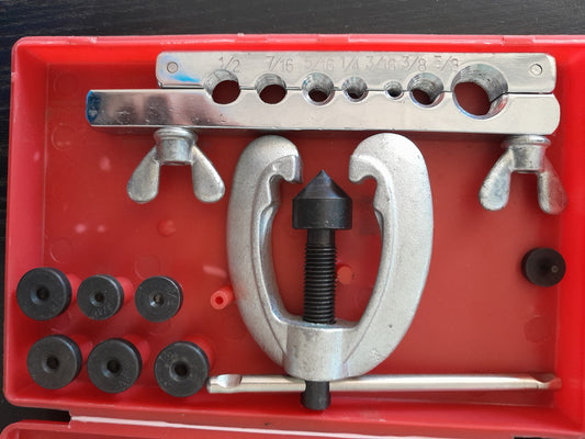 Complete pipe flaring kit for creating leak-proof connections on copper, brass, and aluminum pipes.