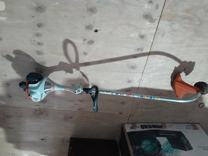Stihl FS38 petrol weed eater for cutting grass and trimming small weeds.