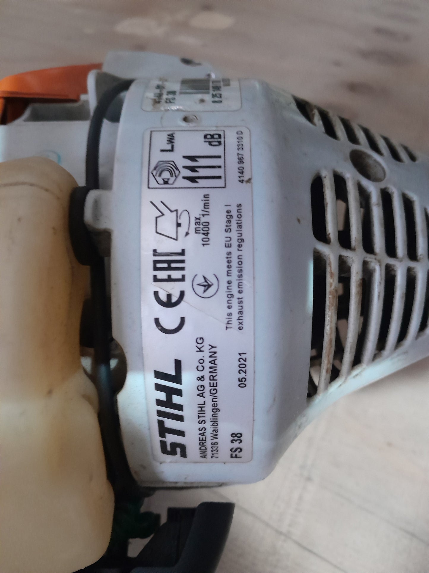 Close-up of Stihl FS38 weed eater, ideal for garden maintenance and grass trimming tasks.