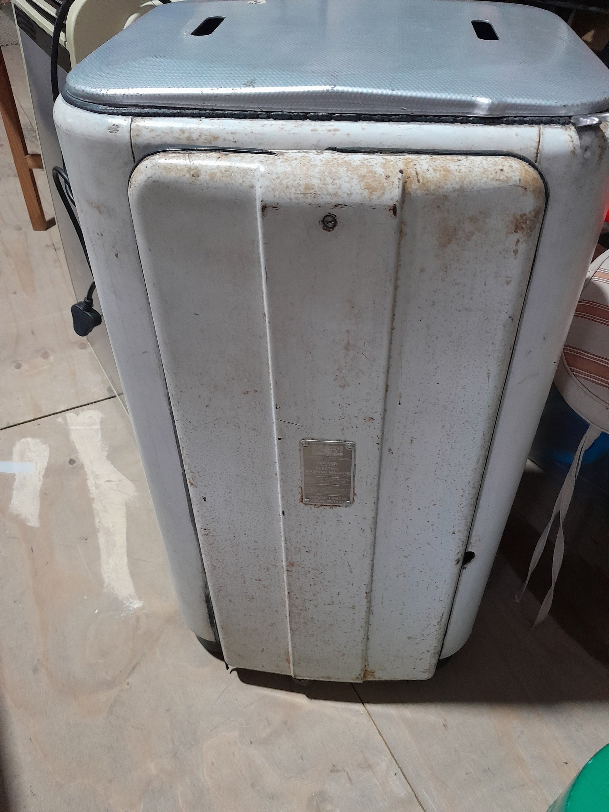 Vintage Hoover washing machine, a classic appliance for retro home decor enthusiasts.