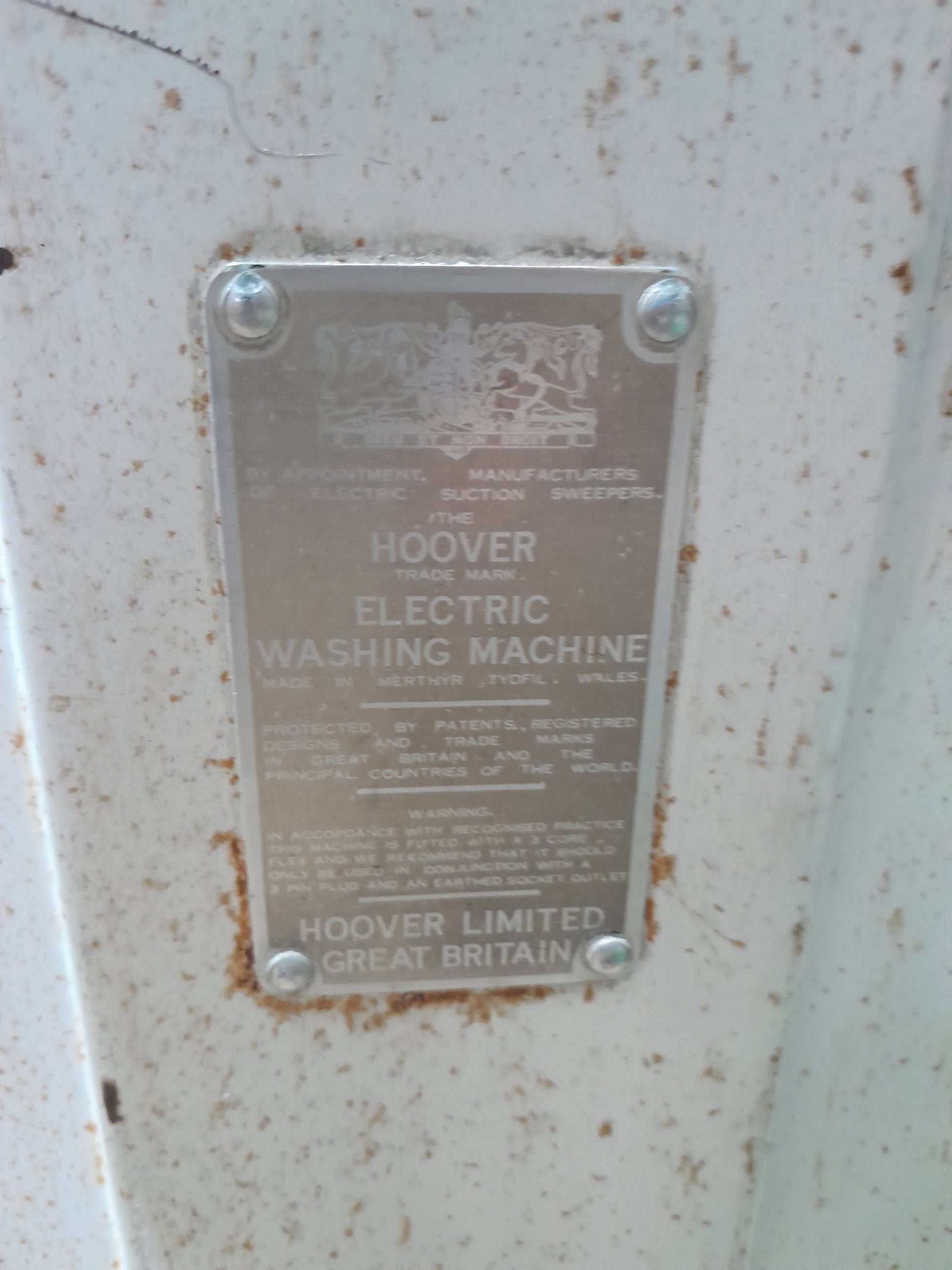 Retro Hoover washing machine in a secondhand store, an ideal addition for vintage appliance enthusiasts.