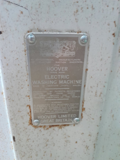 Retro Hoover washing machine in a secondhand store, an ideal addition for vintage appliance enthusiasts.