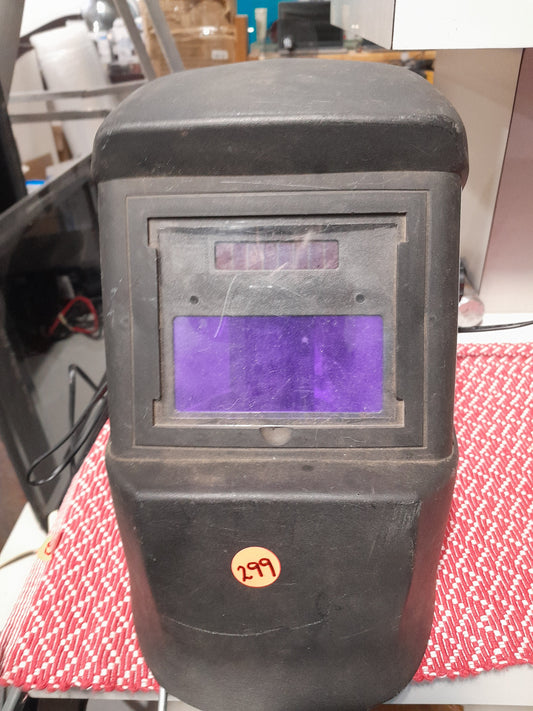 Prolec welding helmet front view showcasing auto-darkening feature and protective design.