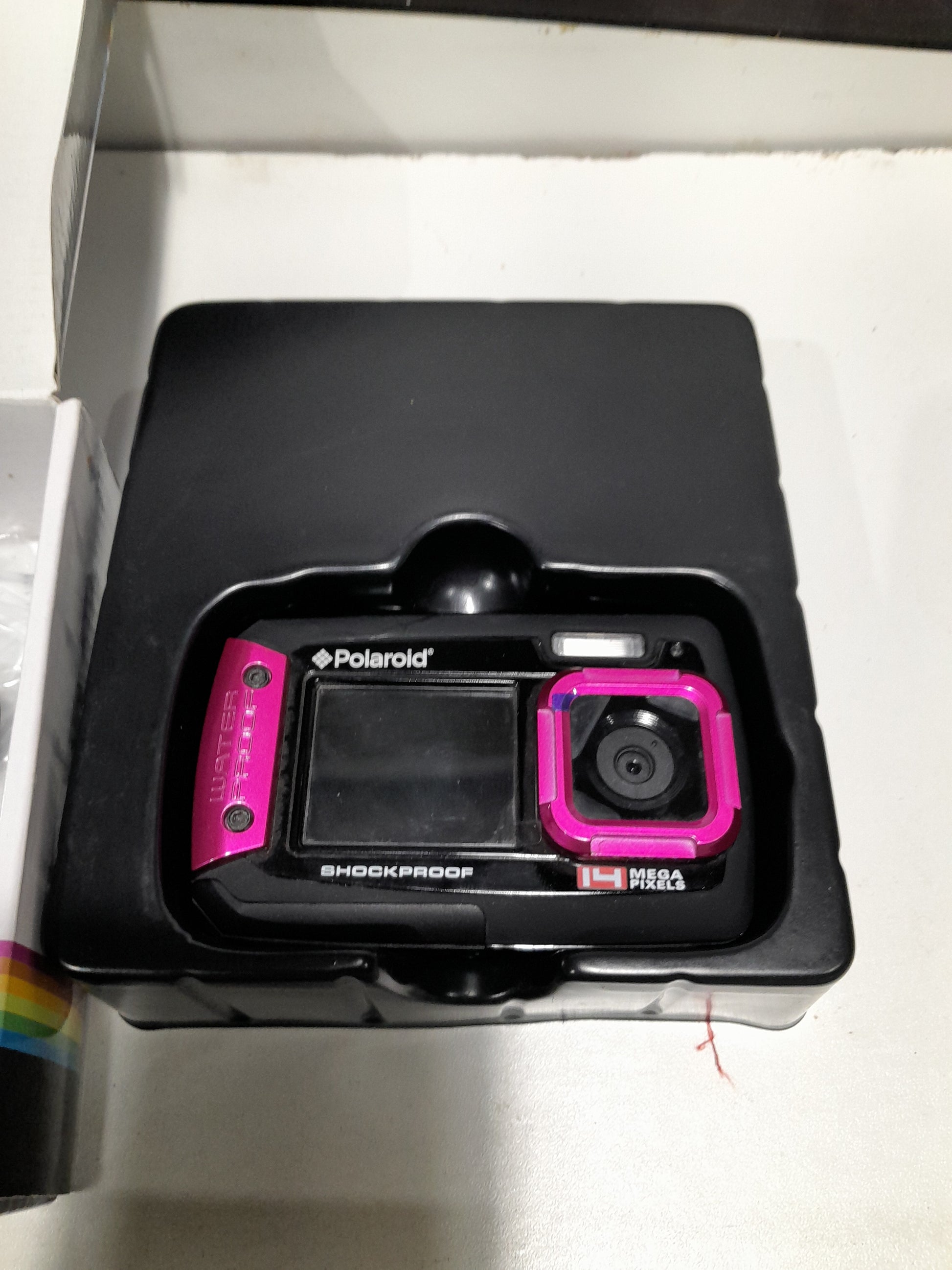 Close-up of waterproof camera box showcasing dual display and 14 megapixels for great selfies.