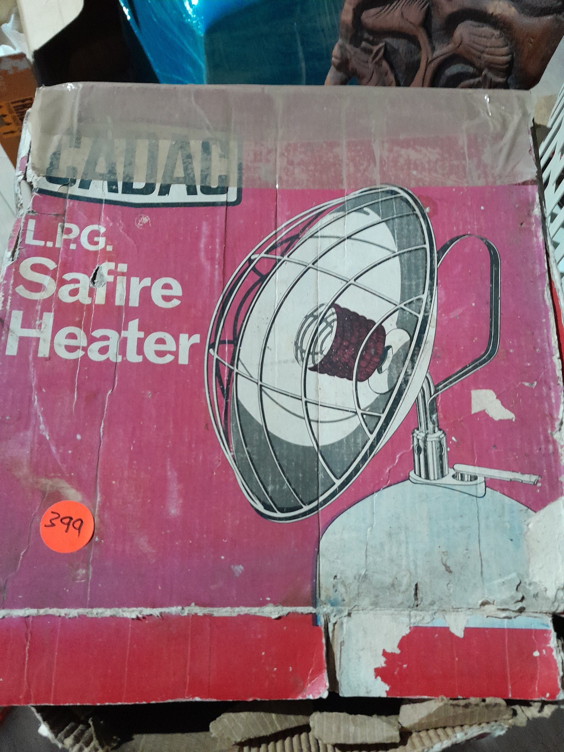 Close-up of the Cadac gas heater's heating element and protective grill for safety.