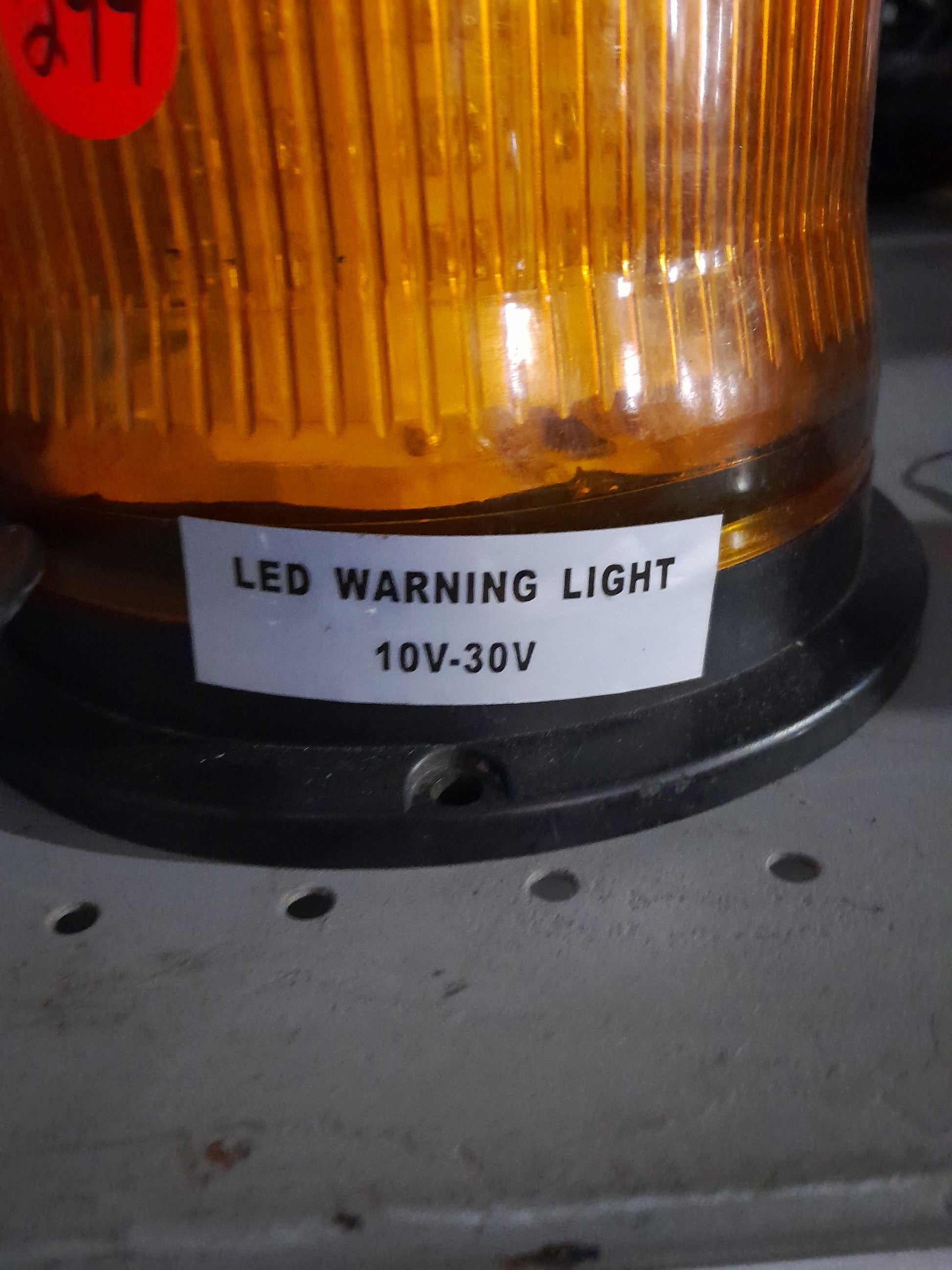 Bright orange LED warning light for emergency vehicles, operating between 10V-30V.