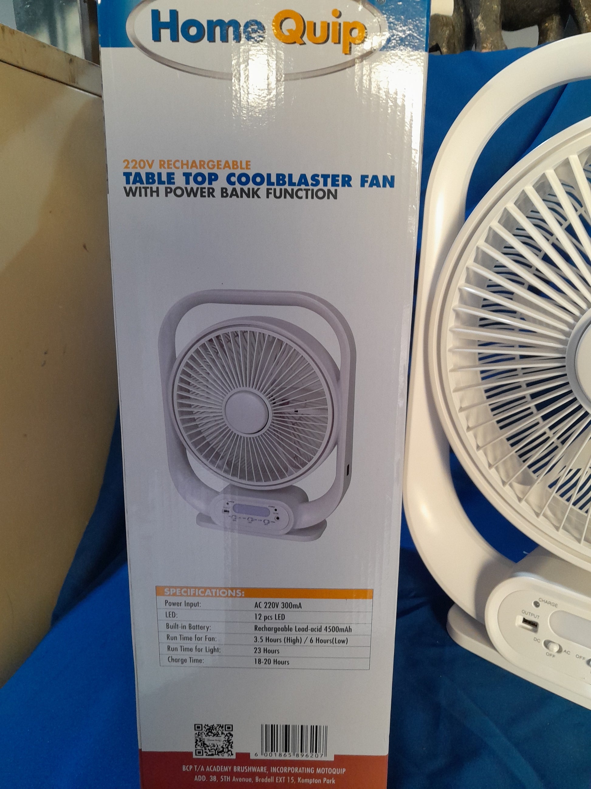Compact HomeQuip coolblaster fan featuring a rechargeable battery and USB port for charging devices.