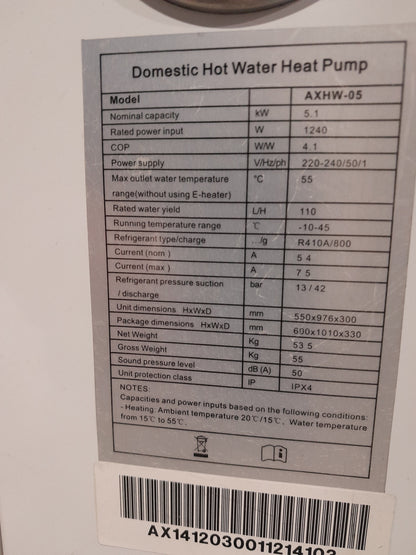 ThermoWise domestic hot water heat pump with a specification label detailing efficiency and operational metrics