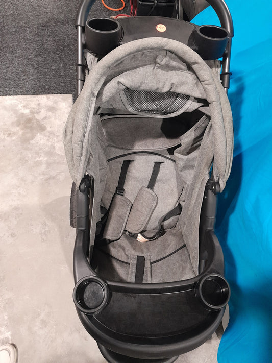 Front view of a Little One baby stroller with a five-point harness, perfect for babies 6 months and older.