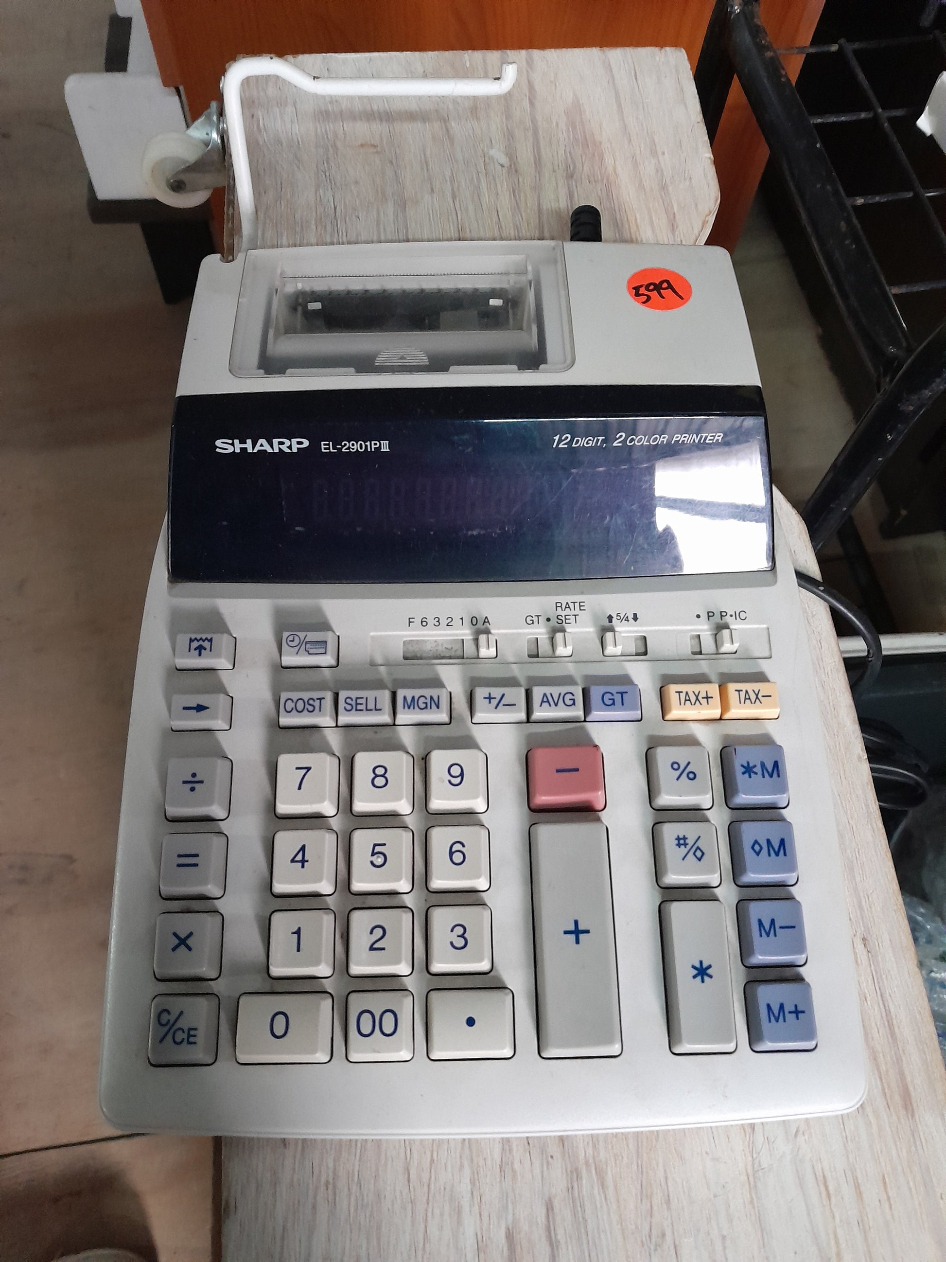 Sharp EL-2901P printing calculator with 12-digit display and 2-color ink printer, ideal for professional accounting.