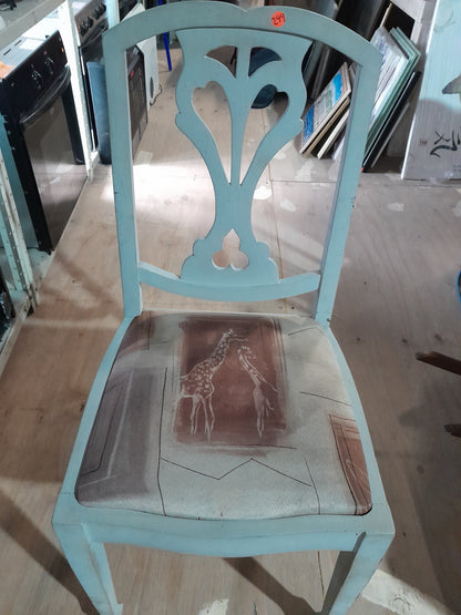 Vintage solid wood chair with light blue frame and giraffe-patterned cushioned seat, unique design for home decor.