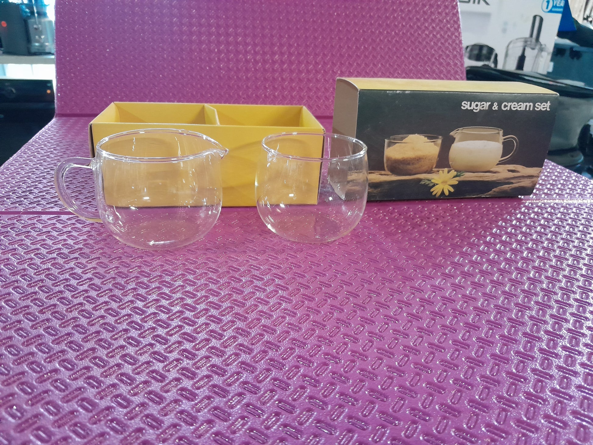 Elegant Vitria Sugar and Cream Set with glass sugar bowl and milk jug, ideal for enhancing tableware and hosting needs.