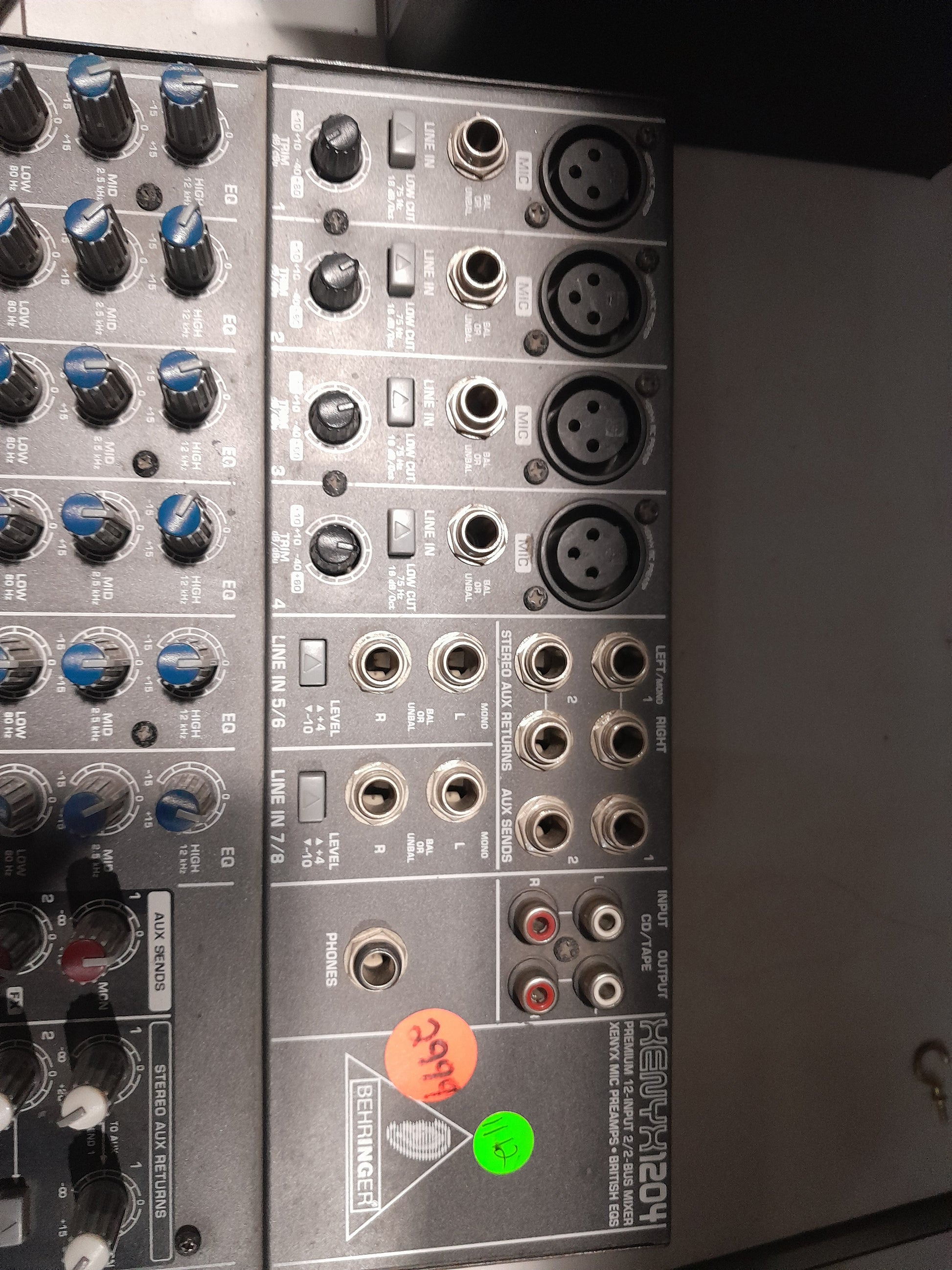 Top view of Behringer Xenyx 1204 USB mixer showcasing controls and connections.