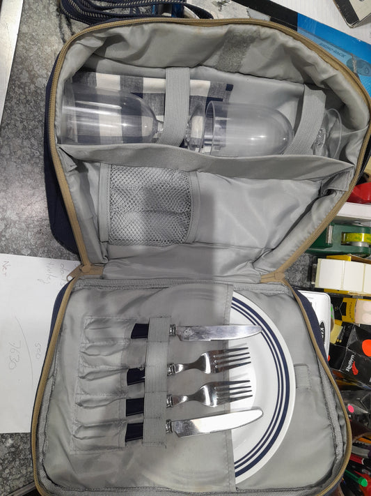 Compact picnic set for two, including utensils, plates, and glasses in a convenient carry bag.