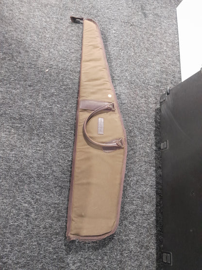 Roland Ward rifle bag made of durable canvas, 48-52 inches long, perfect for outdoor enthusiasts.