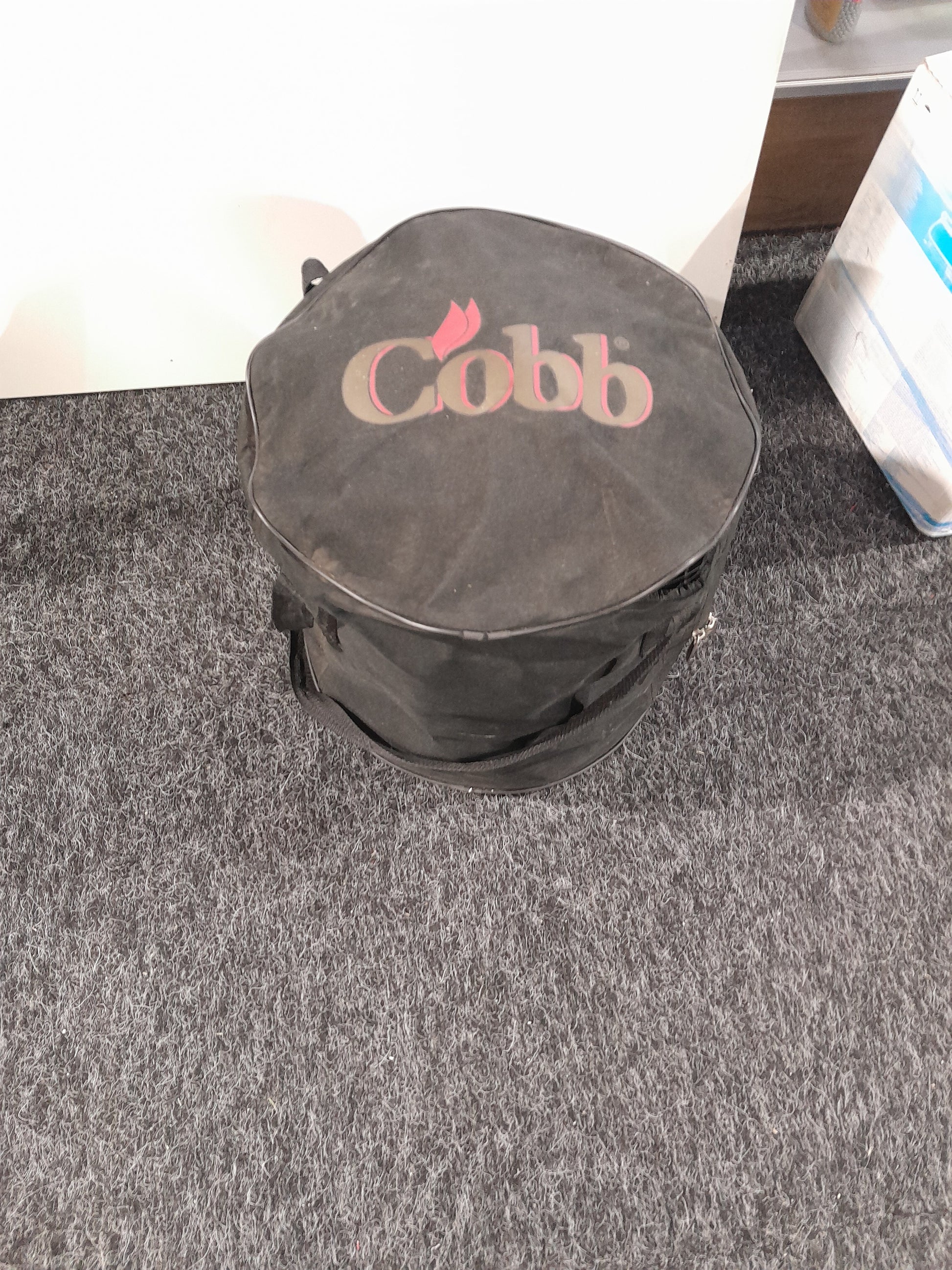Essential cooking gear from Cobb kitchen, perfect for grilling, baking, and frying outdoors.