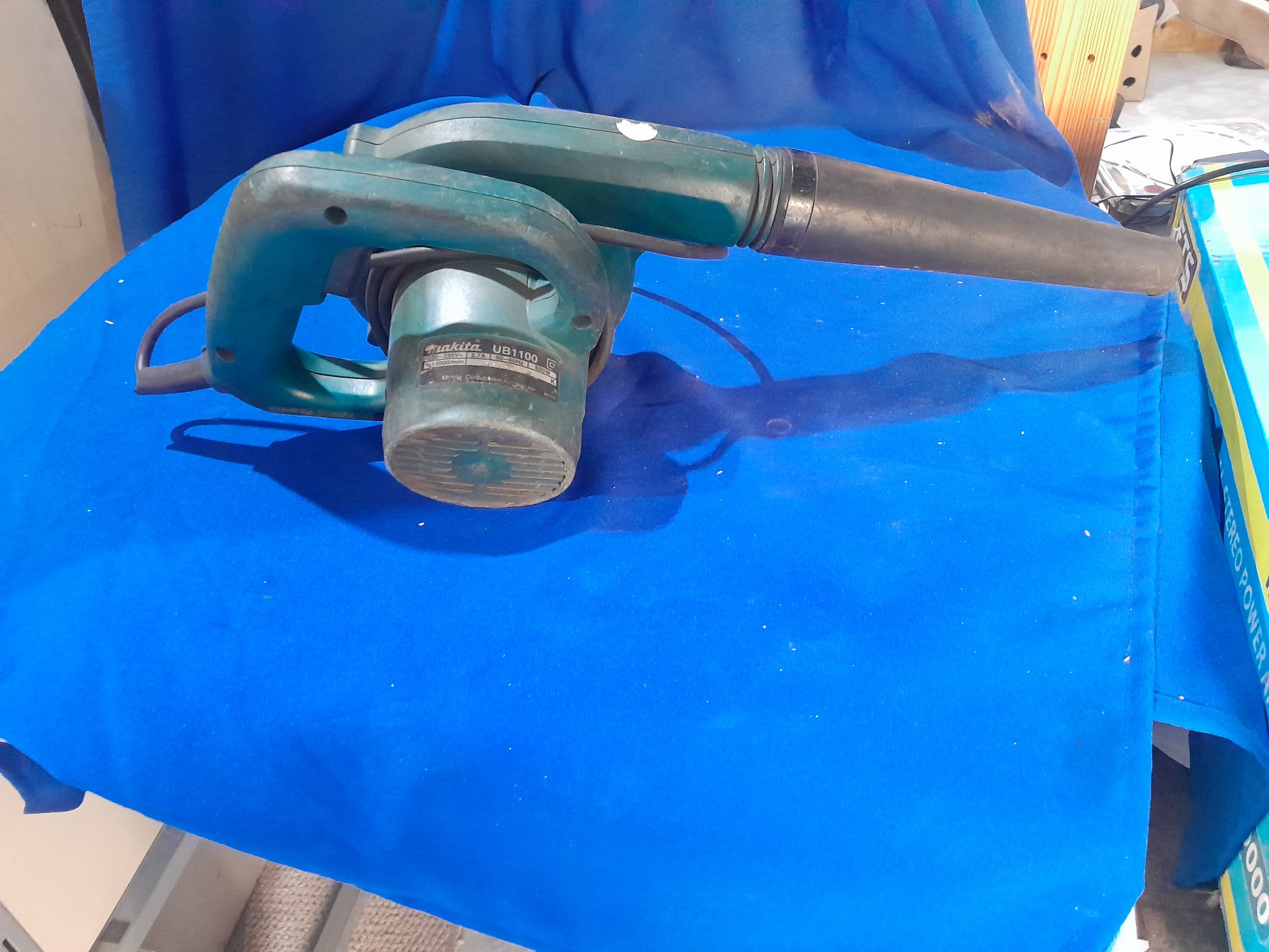 Used Makita electric blower for clearing leaves and debris from driveways and gardens.
