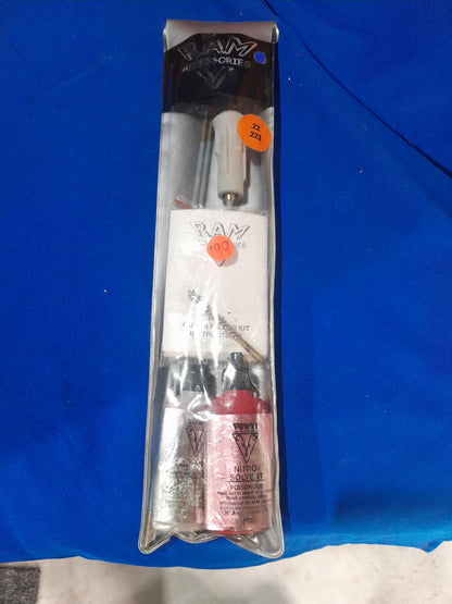 Ram Cleaning Kit for .22mm rifles, featuring essential cleaning supplies and solvents.