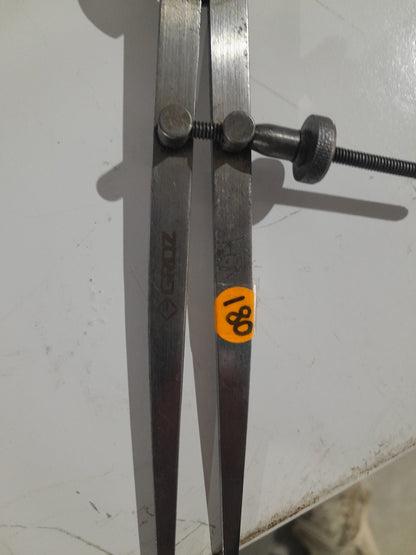 Quality Groz spring divider caliper, perfect for metalworking, measuring, and marking distances accurately.
