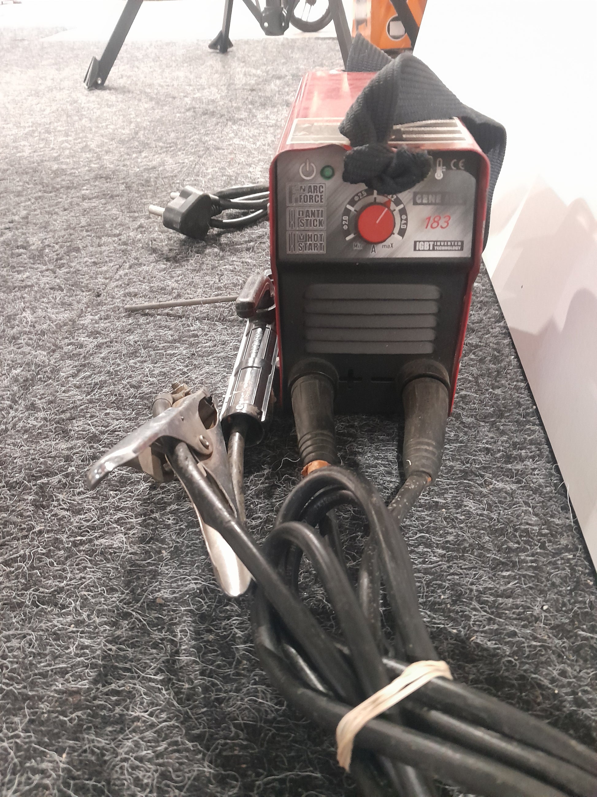 Detailed view of Pinnacle Gene Arc 183 Inverter Welder, highlighting its features and controls.