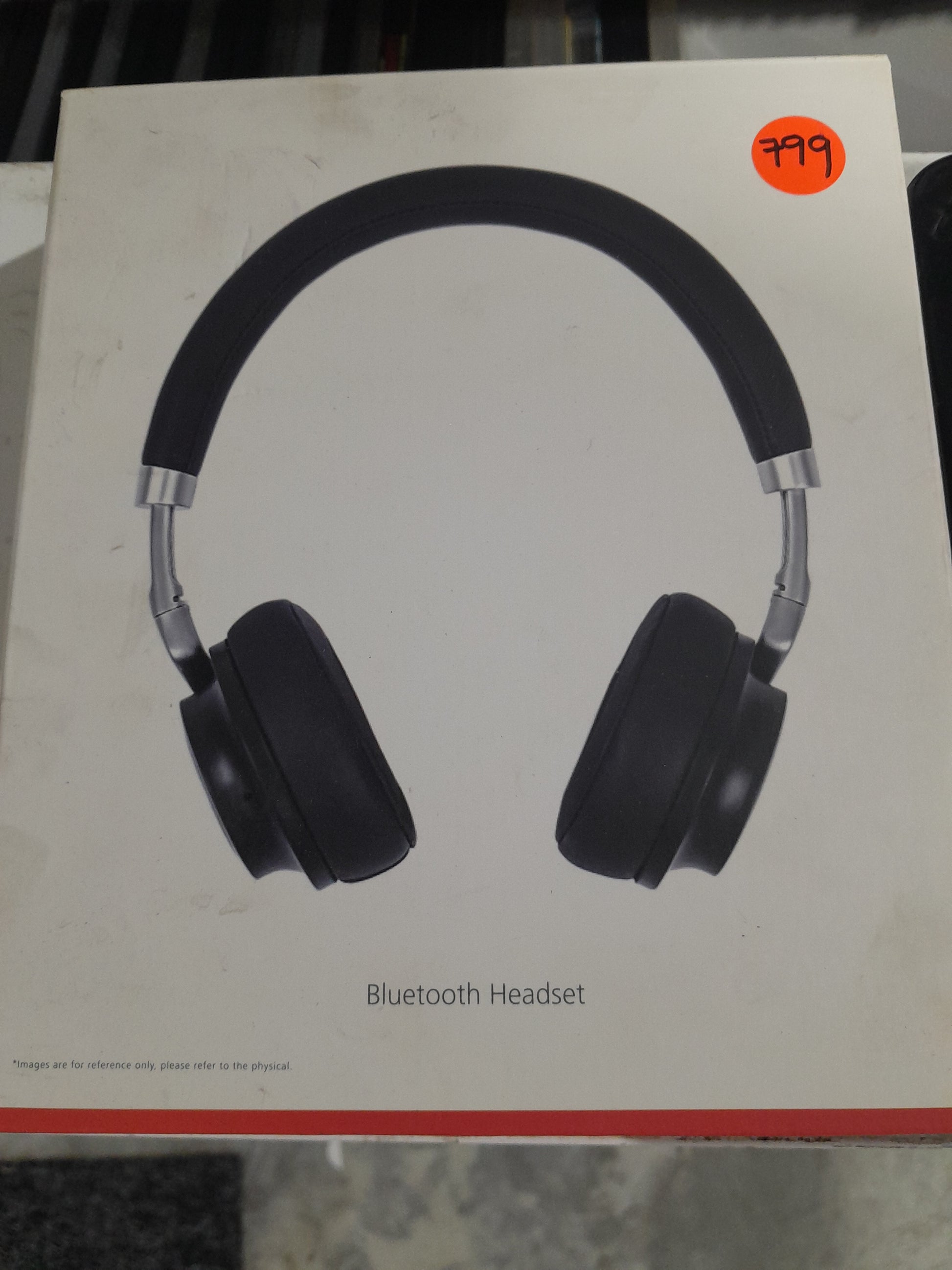 Shenzhen Bluetooth Headset Model H-001 displayed in its packaging, highlighting its modern look.