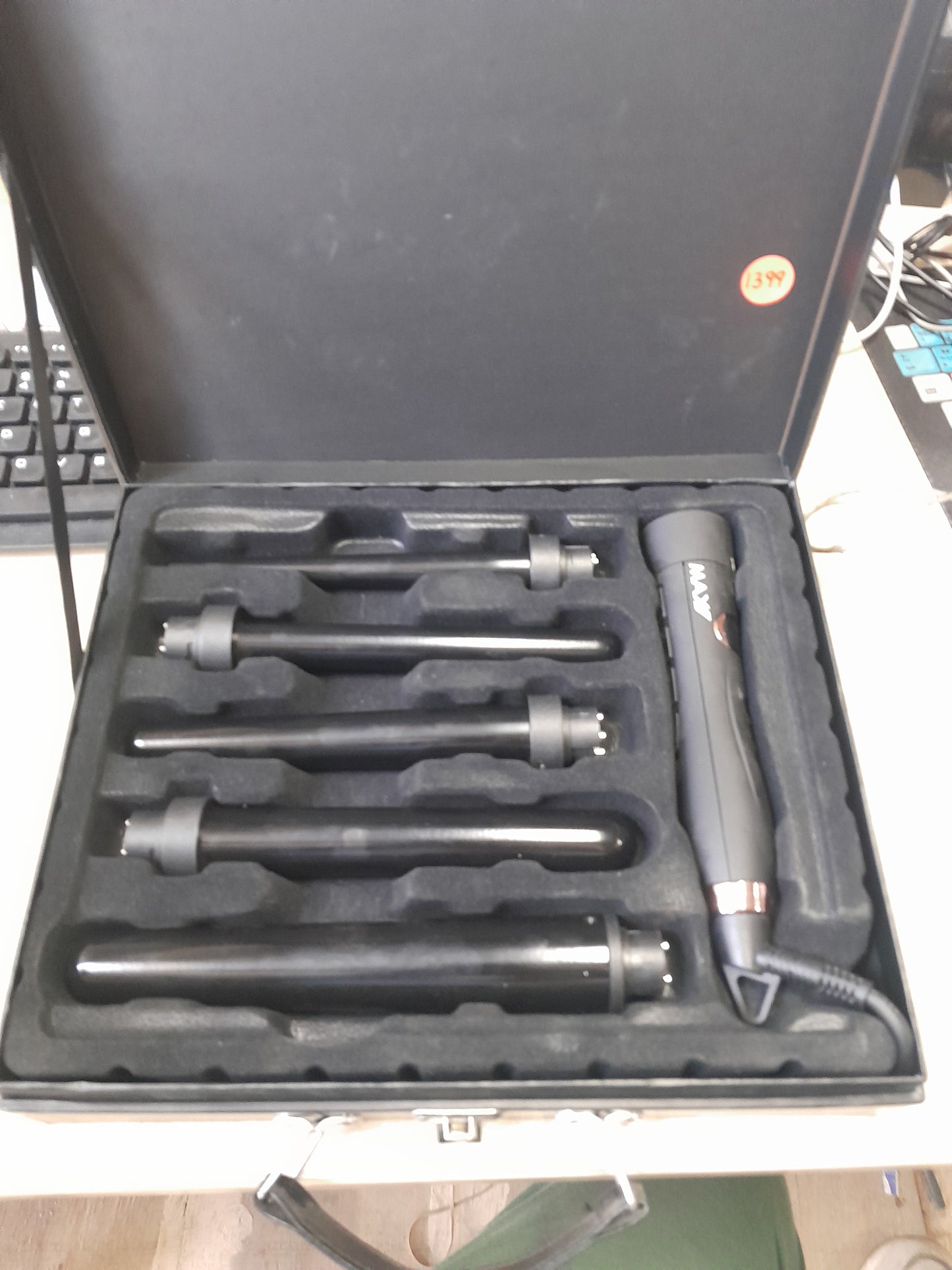 Complete set of Max Pro Miracle 5 in 1 Curling Tongs ideal for creating various hairstyles.